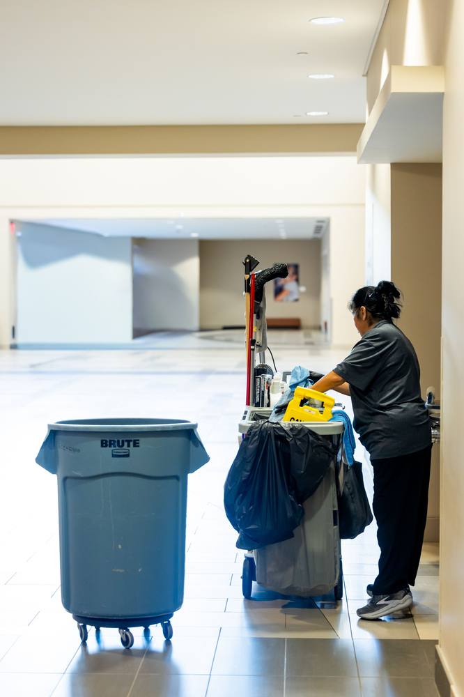 Janitorial cart in a commercial building corridor